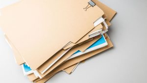 a pile of files ready for a one-time shredding service